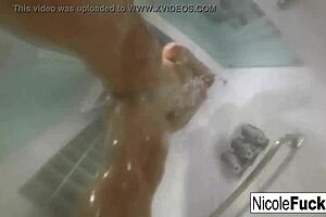 Nicole Aniston indulges in a steamy shower, caressing her big tits and pleasuring herself