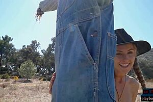 Jennifer, the country girl, enjoys a solo striptease in the great outdoors
