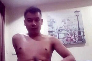 A young Thai man enjoys releasing his semen