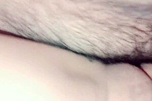A smooth and shaven pussy filled with cum
