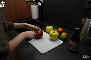 He interrupts her cooking to enjoy her body