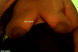 North Indian Aunty Showcases Her Impressive Boobs in a Cultural Display