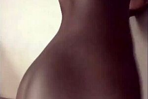 A woman twerks on a vibrating dildo, building up to an intense climax