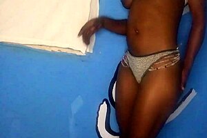 Ebony girl stands enjoying strokes in tight pussy