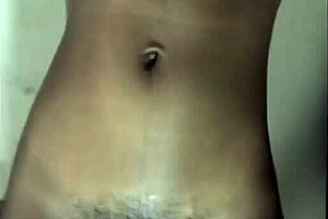 A woman twerks on a vibrating dildo, building up to an intense climax