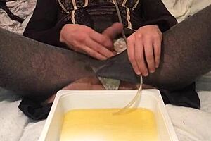 golden piss dripping from a dirty old drunk