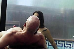 Susy Gala, tattooed brunette, sucks cock and titty wanks in her private pool?