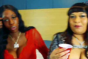 Sipnplay show with Ebony Mystique riding and licking a massive strapon cock.