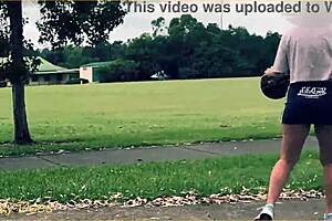 braless milf flashes in short skirt playing basketball outdoors—no panties!