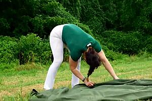 OMG, candid camping in a thong bodysuit with that huge milf ass! 🍑