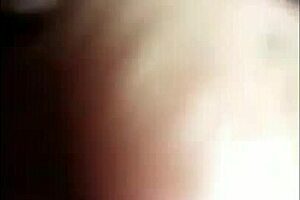 My wife masturbates intensely as a prostitute, fingers deep and moaning loud in the room. She cums hard on the bed.