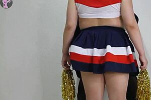 In cheerleader costume, she experiences a massive squirt for the second time.