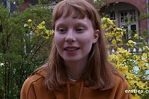 A young and pretty Norwegian woman with natural breasts masturbates and rubs her hairy vagina