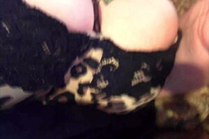 My wife masturbates intensely as a prostitute, fingers deep and moaning loud in the room. She cums hard on the bed.