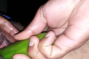 Sexy Indian wife uses vibrator and cucumber on oiled pussy.