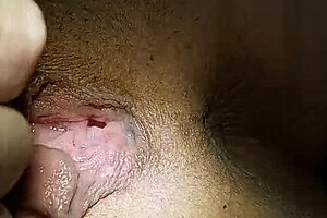 A young and petite Dominatrix achieves orgasm with the help of a sex toy