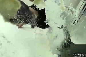 Asian lady stomps noodles in boots for foodcrush fetish