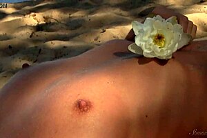 Naked redhead TEEN plays with a WATER LILY