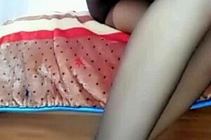 Chinese goddess in high heels and black stockings gets wild