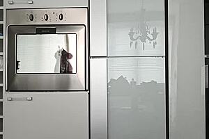 Petite brunette performs short gym routine in leggings showing small tits and narrow ass