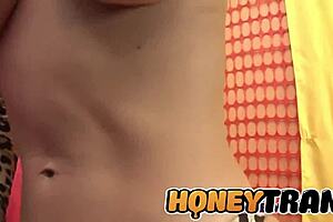 I'm watching Raquel Dorado, that curvy shemale, strip and strok.