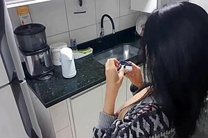 sensual lady in the kitchen masturbating