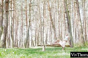 Sexy blonde and hot brunette start kissing in the forest, then move indoors for deeper action.