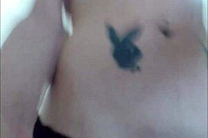 Sexy inked tranny fingers ass on webcam