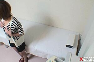 Hidden camera captures a 19-year-old shop girl in the act at Dukhara Gynecologist 002
