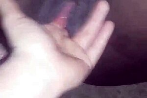 Fingerin' an ebony teen's pussy and it's open wide in this high quality video