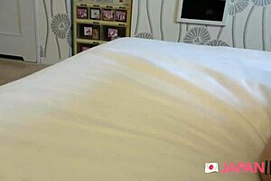 Young Japanese woman with an animalistic look gets a POV facial