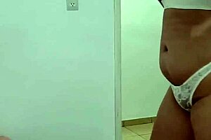 Beautiful young woman in lingerie teases sensually