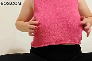 cowgirl in pink top plays with big boobs and squirts during solo orgasm