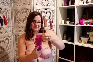 Big beautiful woman showing her big boobs and using a female condom