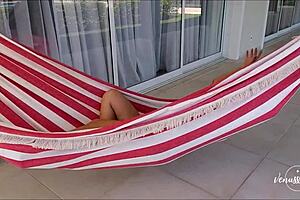 Horny girl wakes up, rubs clit, wets panties with Hitachi