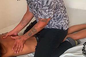 Skinny black stepsister gets a hot massage with oil from a Latino man