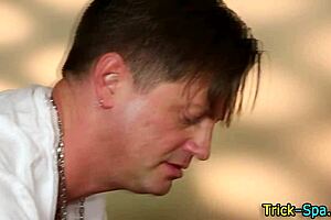 Beautiful woman with a tattoo gets a sensual massage with a happy ending