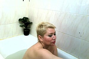 this mature russian chick just cums hard while masturbating in the shower