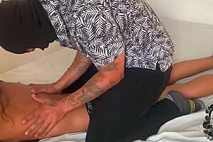 Skinny black stepsister gets a hot massage with oil from a Latino man