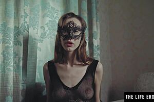 Hot domme spanks herself with riding crop while rubbing wet clit.