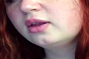 I umm, watchin' that redhead Russian babe dancin' and masturbatin' on webcam