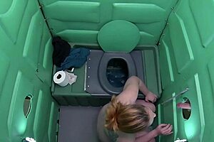 Redhead Swallows Cum at Public Porta Gloryhole Outdoor