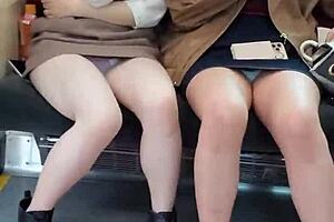 Pretty Asian girls flashing their panties on the train
