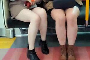 Pretty Asian girls flashing their panties on the train