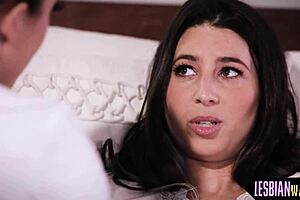 Seductive milf engages in intriguing interaction with cute babe in glamour setting