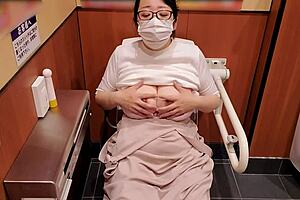 Married woman masturbates in store toilet during shopping