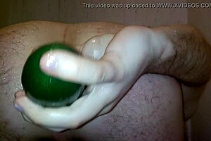 Gay Man Inserts Vegetable in Ass During Shower Play