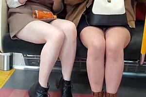 Pretty Asian girls flashing their panties on the train