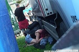 Hidden camera captures big-boobed babe in public sex act at concert