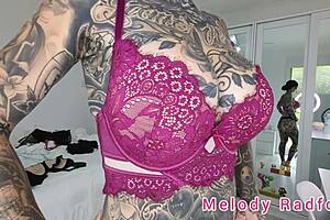 Melody Radford tries on black lingerie in gym.